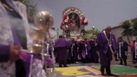 Devotee holds silver incense burner for The Lord of Miracles, Lima, Peru Stock Footage 320373279