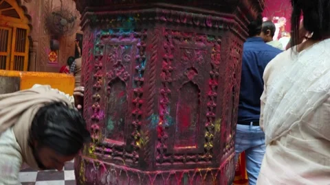 Devotee Lighting Oil Lamps During Worship at Vrindavan Temple Stock Footage 340814464