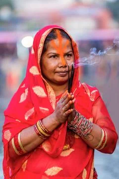 Devotee offering prayers to God During Chhath Puja Festival Stock Photos