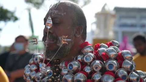 Devotee With Pierced Cheeks And Tongue During Penang Thaipusam Hindu Festival Stock Footage 234038682