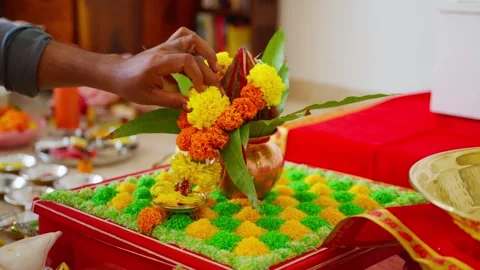 Devotee places blooms on the holy altar Stock Footage 303126145