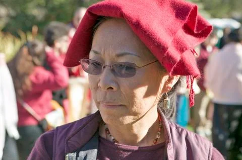 Devotee with prayer shawl attends Amitabha Empowerment Buddhist Ceremony at Stock Photos