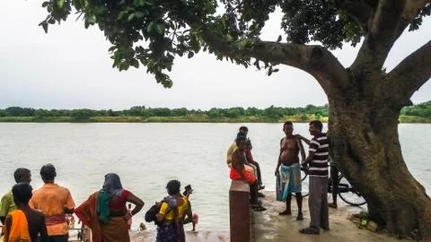 Devotees are preparing to take a bath on the banks of river Ganges Stock Photos