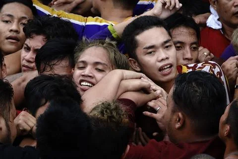 Devotees converge around the procession of the Black Nazarene on New Year?s Eve, Stock Photos