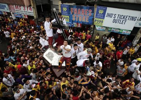 Devotees converge around the procession of the Black Nazarene on New Year?s Eve, Stock Photos
