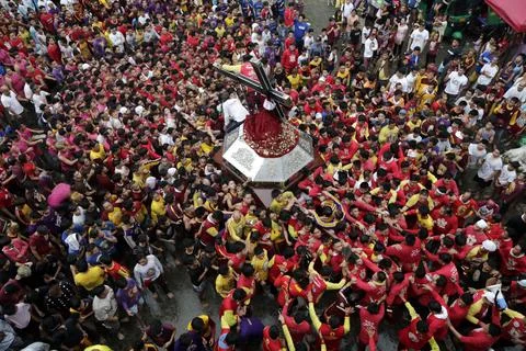 Devotees converge around the procession of the Black Nazarene on New Year?s Eve, Stock Photos
