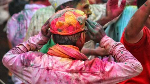 Devotees dancing to bid adieu to Lord Ganesha in Delhi during Ganesh Visarjan Stock Photos