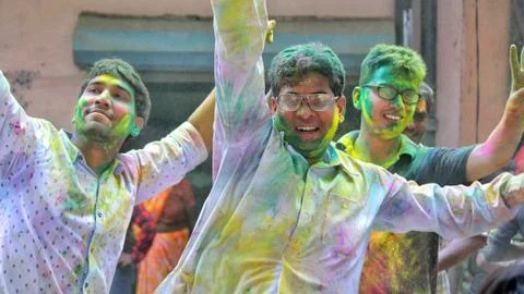Devotees dancing to bid adieu to Lord Ganesha in Delhi during Ganesh Visarjan Stock Photos