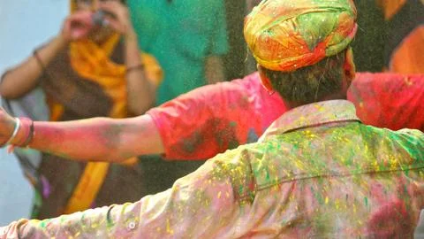 Devotees dancing to bid adieu to Lord Ganesha in Delhi during Ganesh Visarjan Stock Photos