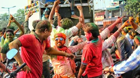 Devotees dancing to bid adieu to Lord Ganesha in Delhi during Ganesh Visarjan Stock Photos