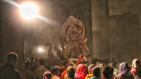 Devotees dancing to bid adieu to Lord Ganesha in Delhi during Ganesh Visarjan Stock Photos
