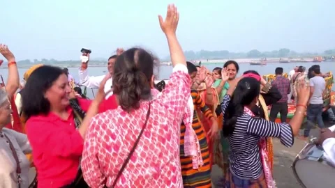 Devotee's Dancing In Yamuna Ghat in Vrindavan Stock Footage 132086833