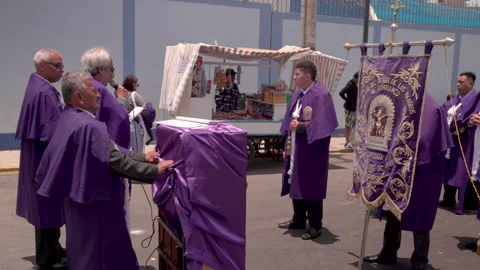 Devotees dressed in purple make a speech for El Señor de los Milagros, Peru Stock Footage 320373259
