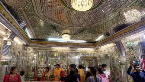 Devotees Exploring Ornate Mirror Mahal Interior with Intricate Glass Mosaic Stock Footage 340818310