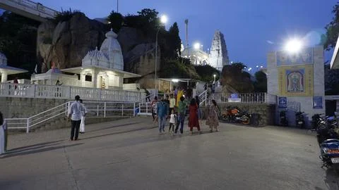 Devotees in front of Birla Mandir, Hindu temple in evening after sunset in .. Stock Photos