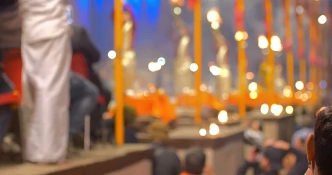 Devotees gathered and watching Ganges aarti prayers at sunset, India Stock Footage 113993368