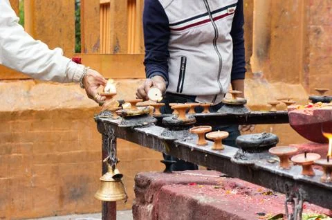 Devotees Offering Butter Lamps Stock Photos