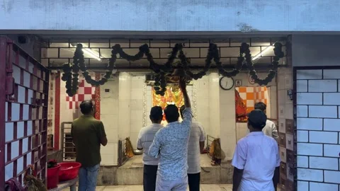 Devotees Offering Evening Prayer Inside Hindu Temple During Aarti Ceremony Stock Footage 339264378