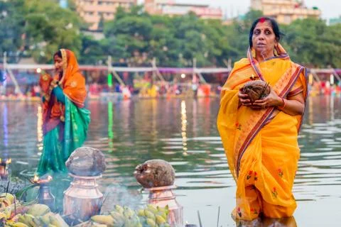 Devotees offering prayers to God During Chhath Puja Festival Stock Photos