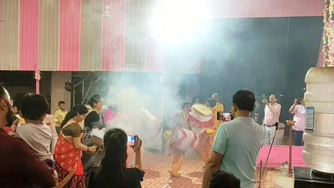 Devotees perform Dhunuchi dance during Durga Puja festival, India. Video stock 217658100