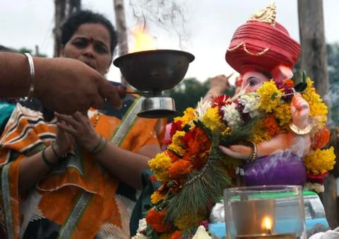 Devotees perform pooja before carrying an Stock Photos