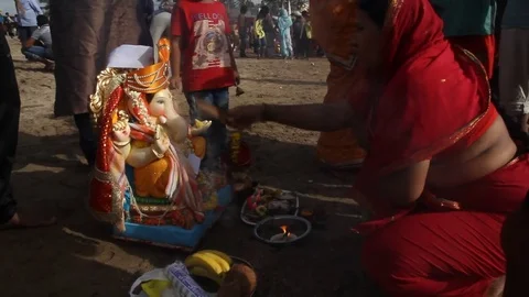 Devotees perform pooja Stock Footage 79556872