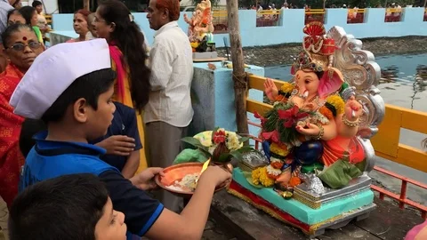 Devotees perform puja Stock Footage 95071815