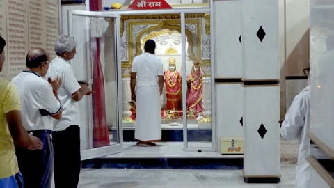 Devotees performing aarti and puja of Lord Ram, Rama. Jai Sri Ram. Mandir. Stock Footage 195317022