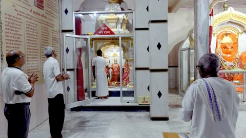 Devotees performing aarti and puja of Lord Ram, Rama. Jai Sri Ram. Mandir. Stock Footage 195317472