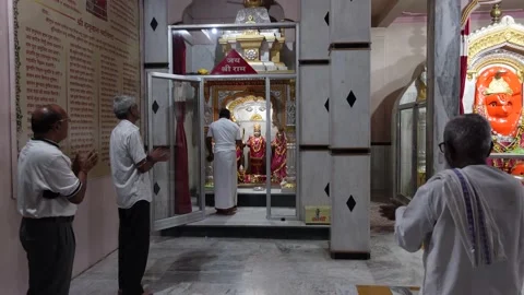 Devotees performing aarti and puja of Lord Ram, Rama. Jai Sri Ram. Mandir. Stock Footage 195317845