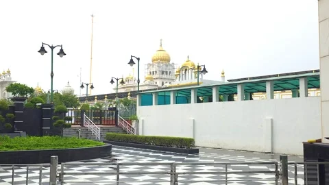 Devotees Performing Seva at Bangla Sahib Gurdwara Stock Footage 320385680