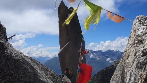 Devotees praying at Rock Shivling, part of the Hindu pilgrimage Kinner Kail.. Video stock 260887532