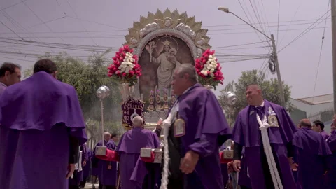 Devotees in purple celebrate Señor de los Milagros. LIMA, PERU 2025/11/02 Stock Footage 320373230
