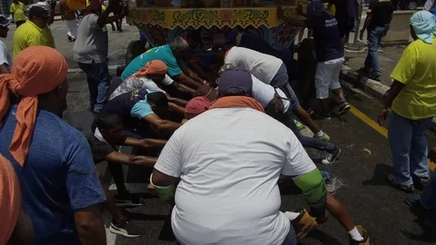 Devotees push the chariot at back with t... | Stock Video | Pond5