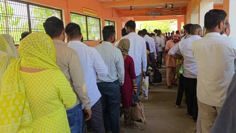 Devotees Standing in Line at Village Temple Stock Footage 313571577