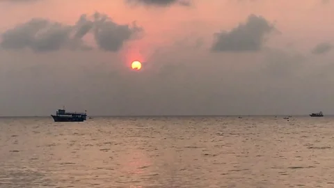 Devotees take bath at Agni theertham Stock Footage 84627102