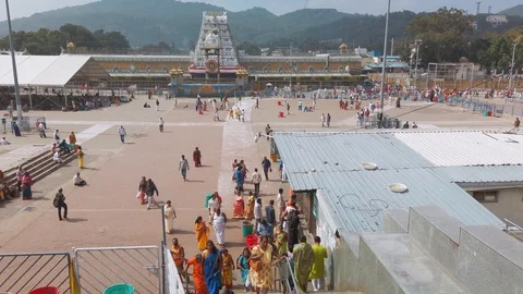 Devotees visit Balaji temple at Tirumala hill. Stock Footage 124619648