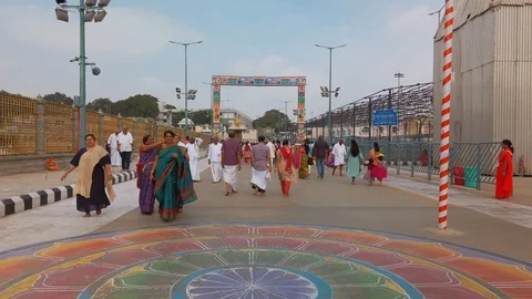 Devotees visit Balaji temple at Tirumala hill. Stock Footage 124620434