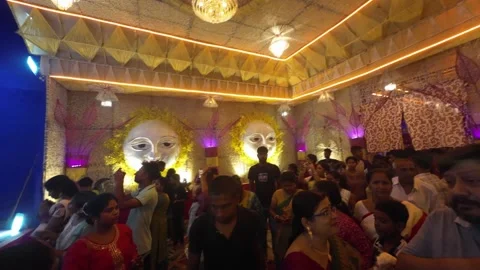 Devotees Visiting Brightly Decorated Durga Puja Pandal with Traditional Video stock 318519823