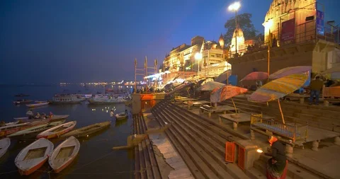 Devotees waiting in small boats on Ganges river banks for aarti prayers, India Stock Footage 113721129