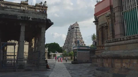 Devotees Walking at Chidambaram Nataraja Temple Courtyard with Colorful Stock Footage 338037838
