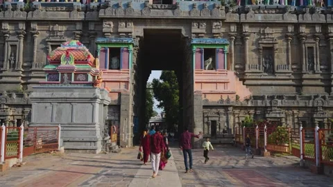 Devotees Walking Through Ornate South Indian Temple Gopuram Gateway Stock Footage 338064641