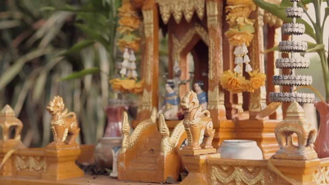 Devotional Offering with Smoke and Flame at Thai Spirit House Stock-Footage 333704115