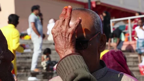 Devotional Tilak Application on devotee head with Jai Shree Ram Inscription.. Stock Footage 337334179