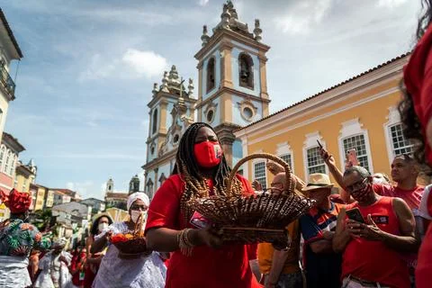 Devout Catholics of Santa Barbara carry gifts to the saint. Stock Photos