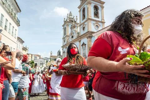 Devout Catholics of Santa Barbara carry gifts to the saint. Stock Photos