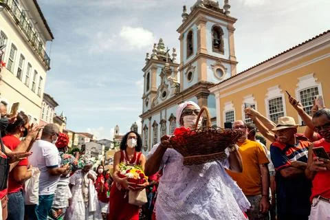Devout Catholics of Santa Barbara carry gifts to the saint. Stock Photos
