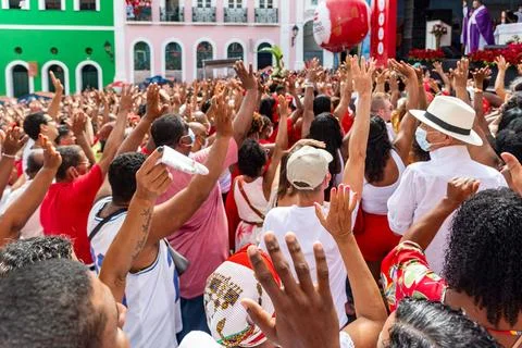 Devout Catholics of Santa Barbara raise their arms to the sky in honor of Santa Stock Photos