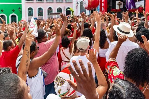 Devout Catholics of Santa Barbara raise their arms to the sky in Stock Photos