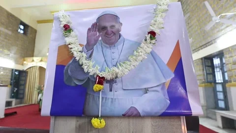 Devout Indians pray in Bangalore for the passing of Pope Francis, BANGALORE, IN  Video stock 307220336